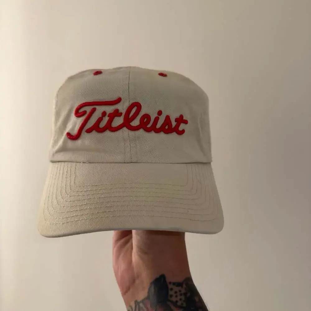 Titleist Beige Cotton Strapback Hat with Embroidered Nebraska Cornhuskers N Logo